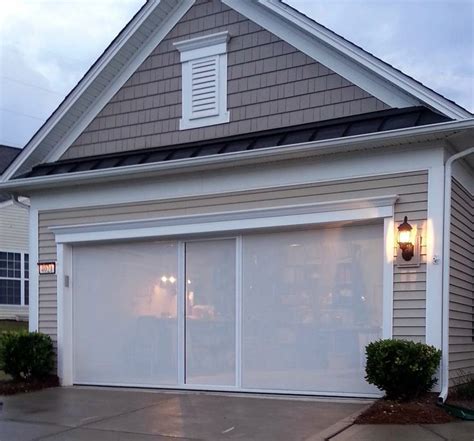 How Magic Screen Garage Doors Improve Your Home's Value